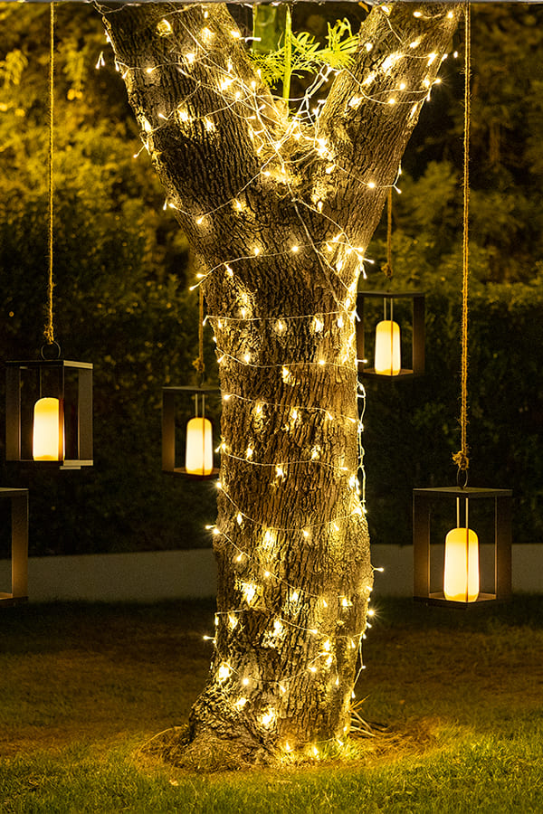 Newgarden's Garlands offer vibrant, weather-resistant string lights with energy-efficient LED technology, ideal for creating a festive atmosphere indoors or outdoors.