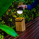 Sustainable Lighting: Charge the Okinawa Lantern Effortlessly with Solar Power, Featuring a Durable Metal Handle.