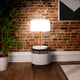 Chloe Plant Floor Lamp by Newgarden: Stylishly Adjustable with Wooden Legs for Indoor & Outdoor Elegance.