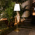 Elevate Your Space: The Lola Slim 180 Lamp Adds Elegance with Vibrant Colors & Warm Ambiance, Indoors or Out.